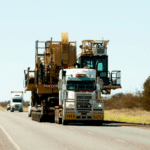 Efficient heavy-duty transport for construction projects, ensuring safe and timely delivery of your entire fleet.