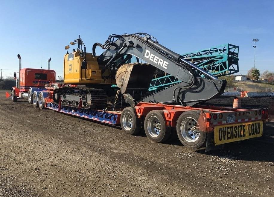 Efficient heavy-duty transport for construction projects, ensuring safe and timely delivery of your entire fleet.